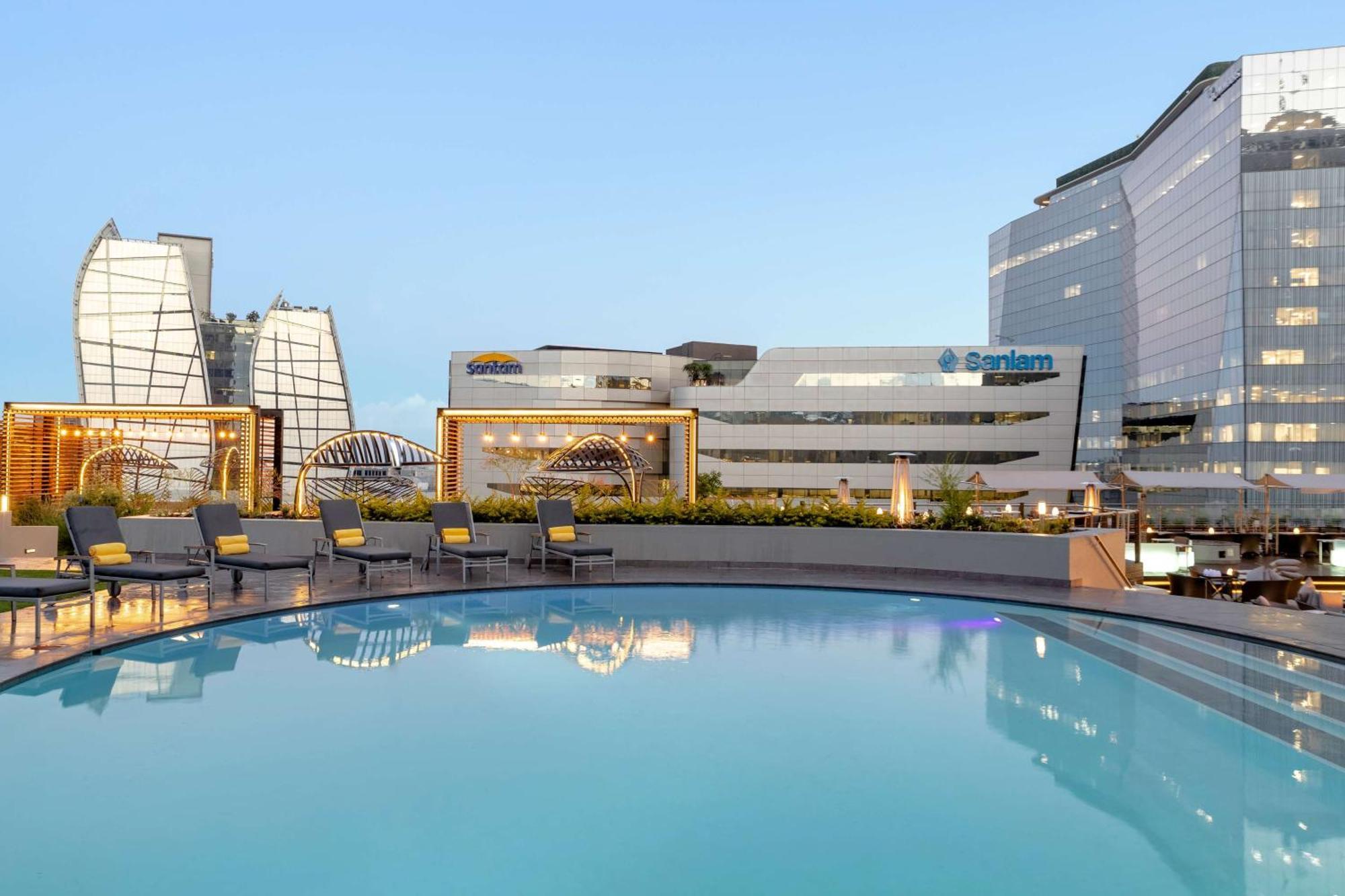 Sandton Sun And Towers Johannesburg Exterior photo The pool at the West Hollywood Edition